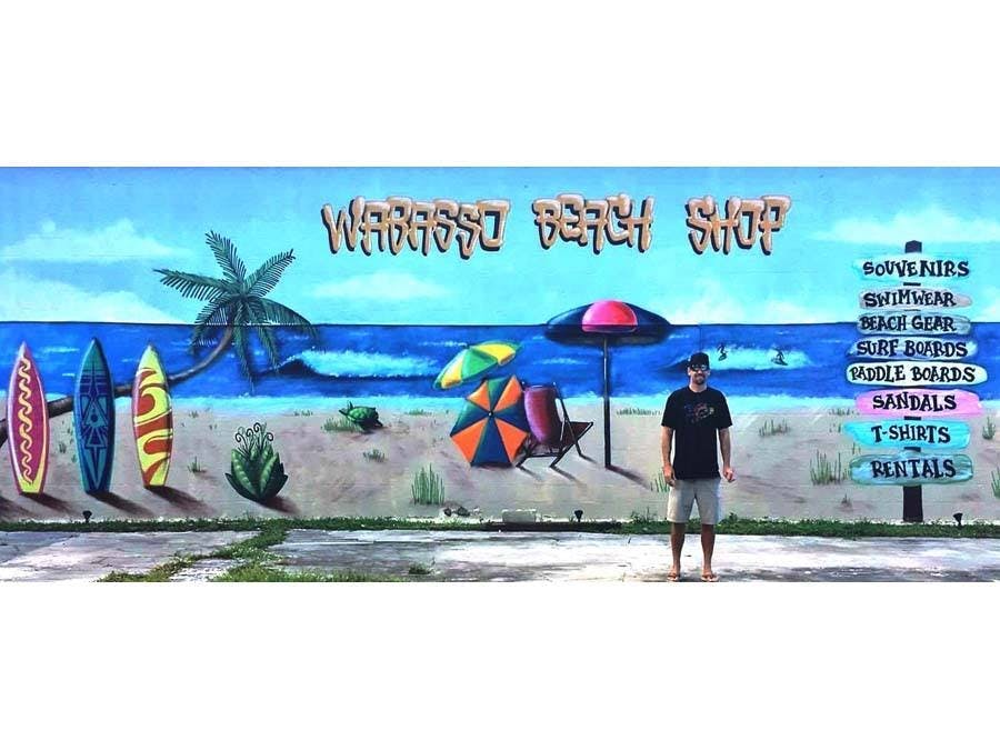 Full Wall Muriel of Beach Scene on rear of building.	